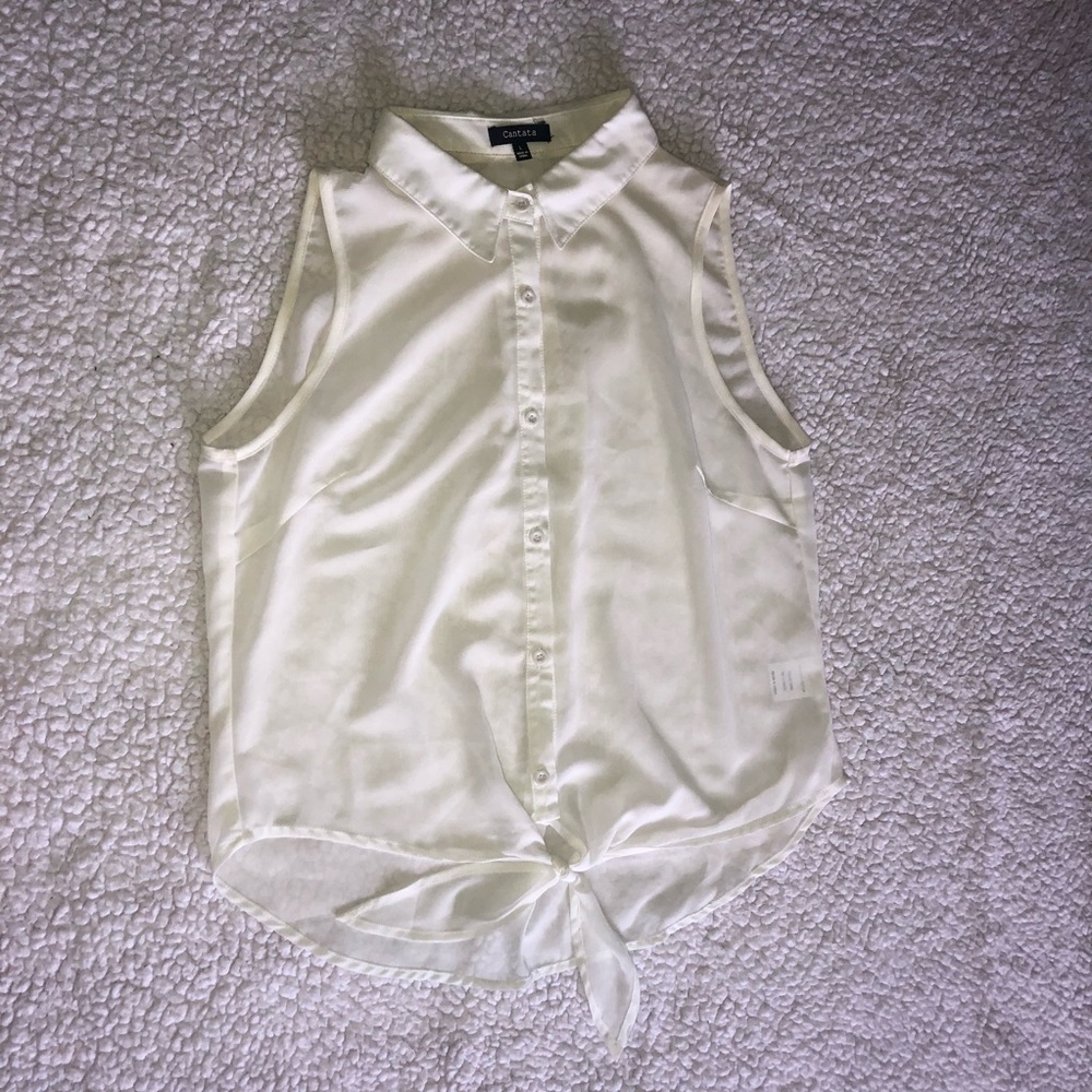 White sleeveless button up tied shirt